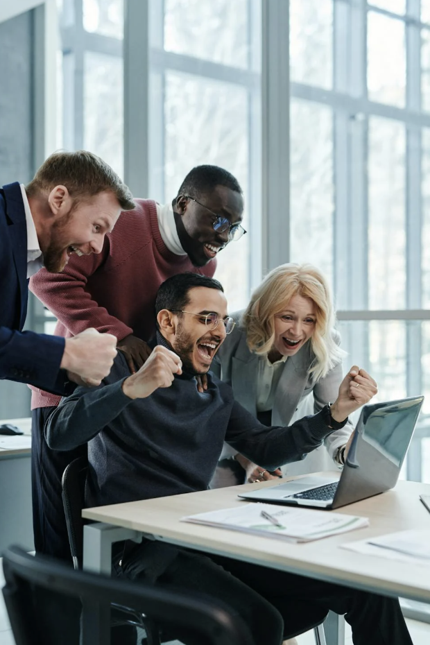 A team of co-workers celebrating