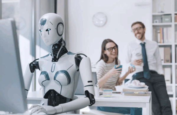 A robot with two human employees at the back talking. 