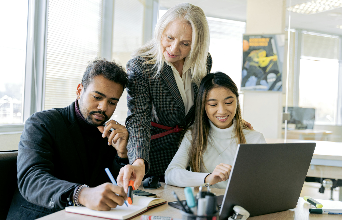 A Group of People Having a Meeting in the Office