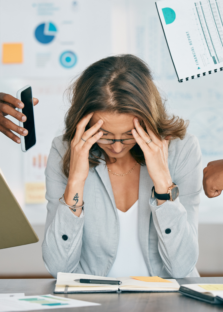 A woman leader thinking with her hands on her head
