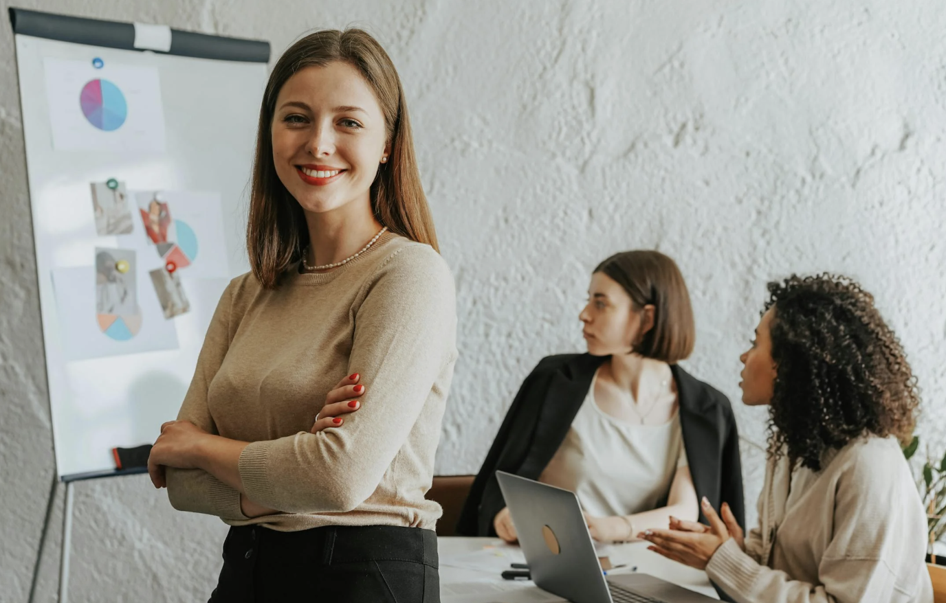 A confident woman leader displaying emotional intelligence