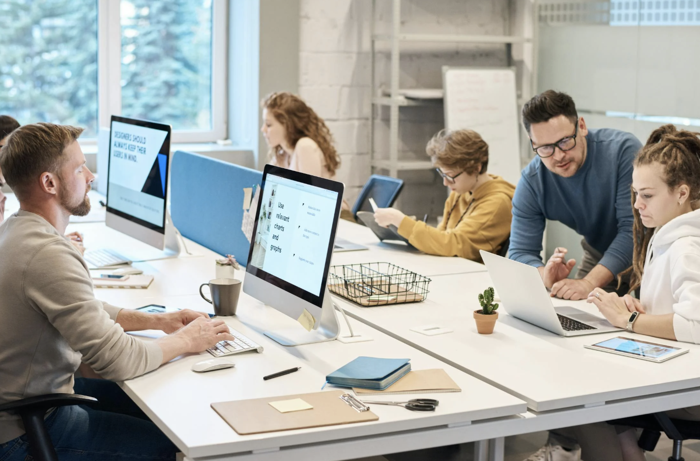 A group of co-workers working as a team