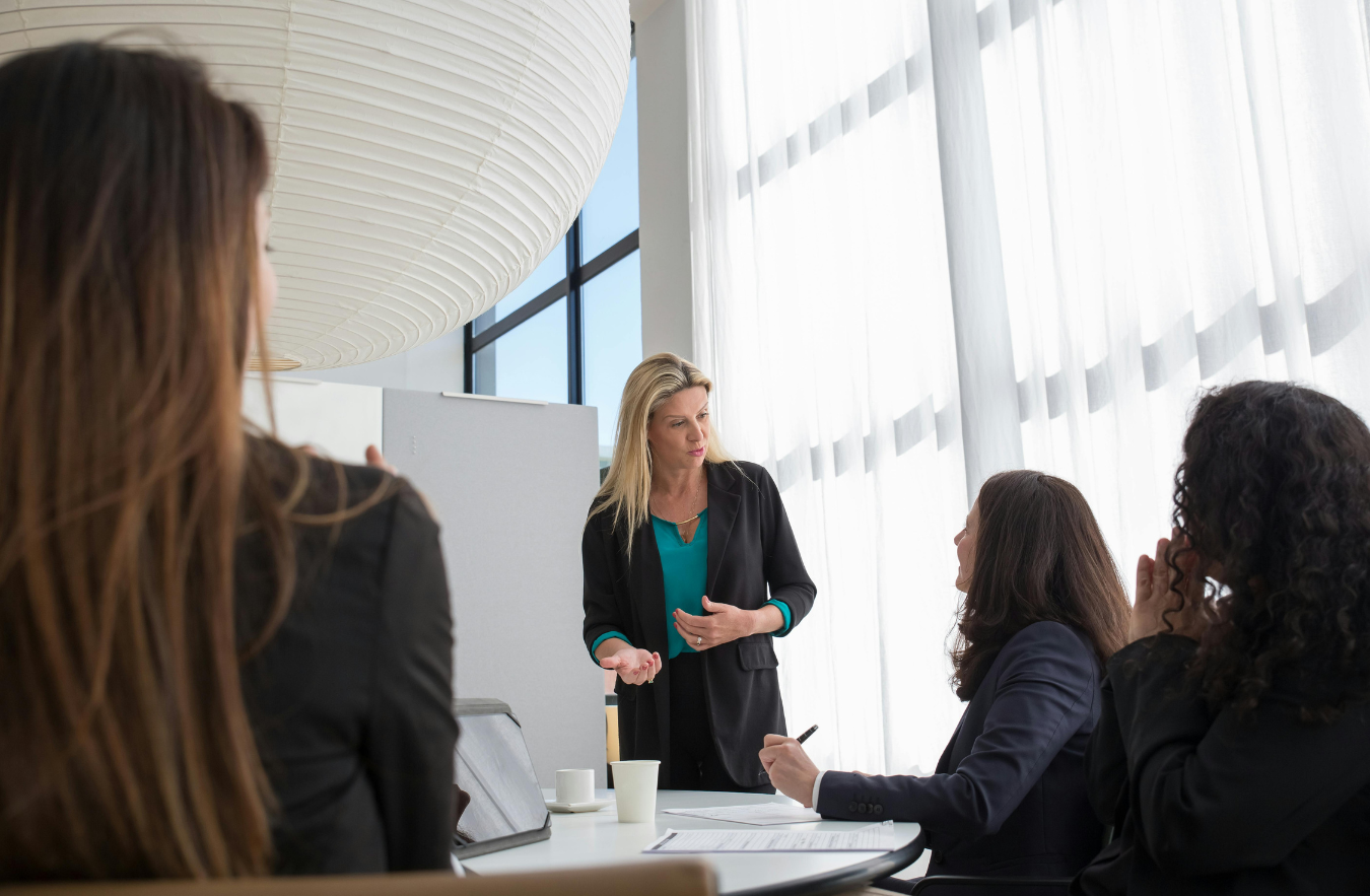 A businesswoman leading a meeting.