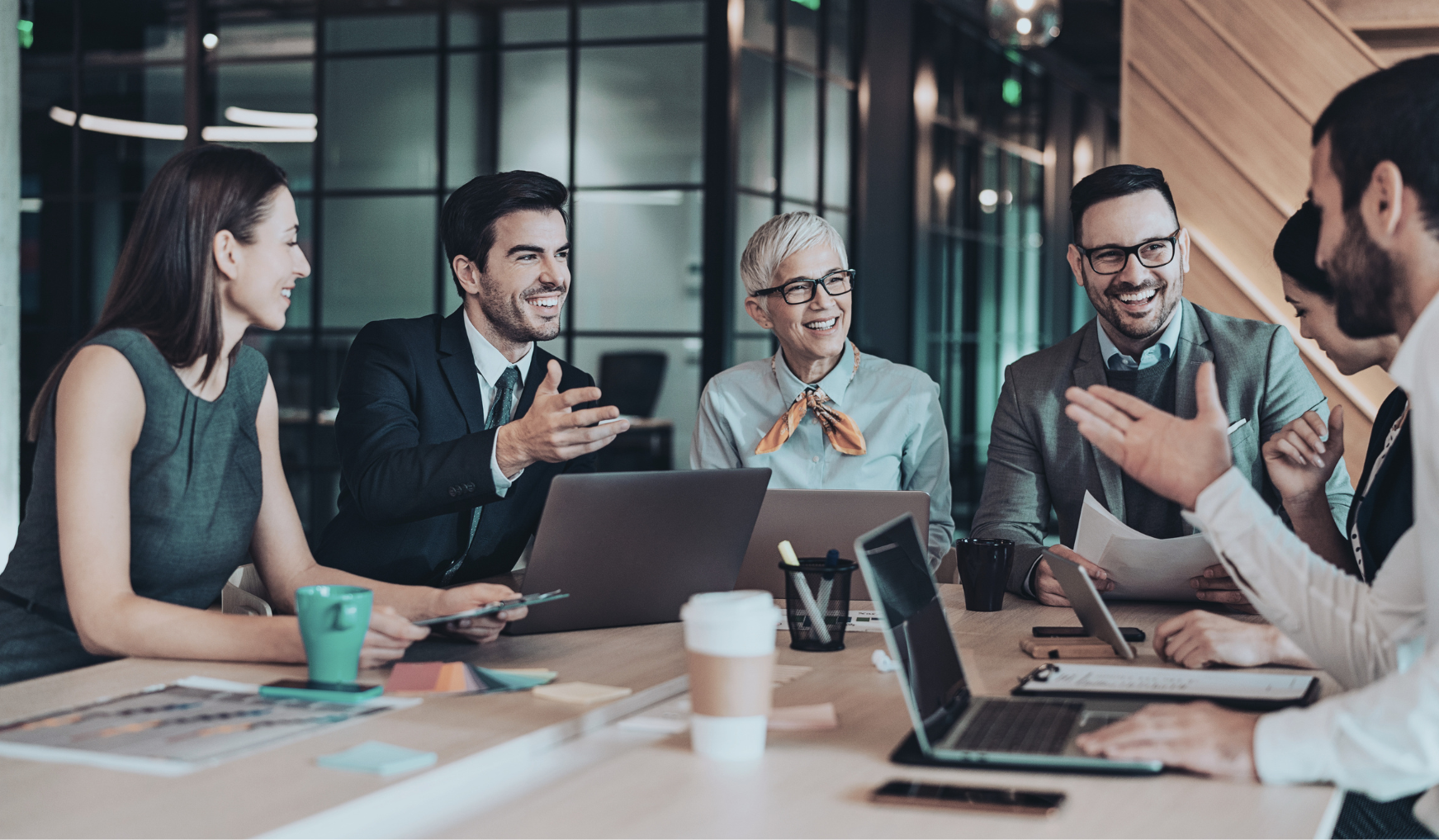 A group of coworkers amicably working together.