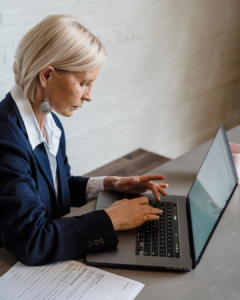 A businesswoman working on her laptop.