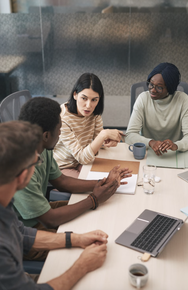 A group of employees engaged in the dicussion